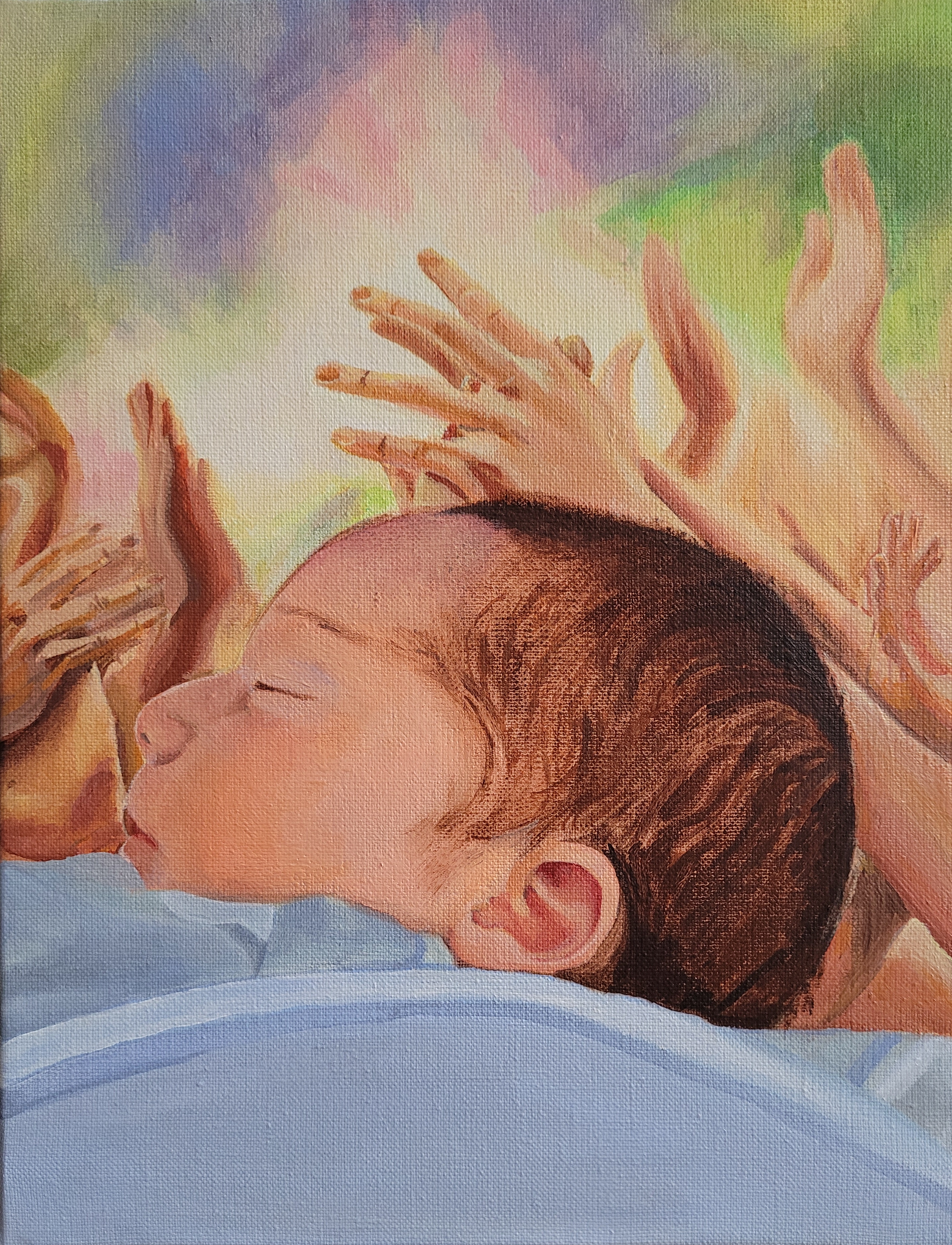 A newborn is asleep. Hands are clapping.