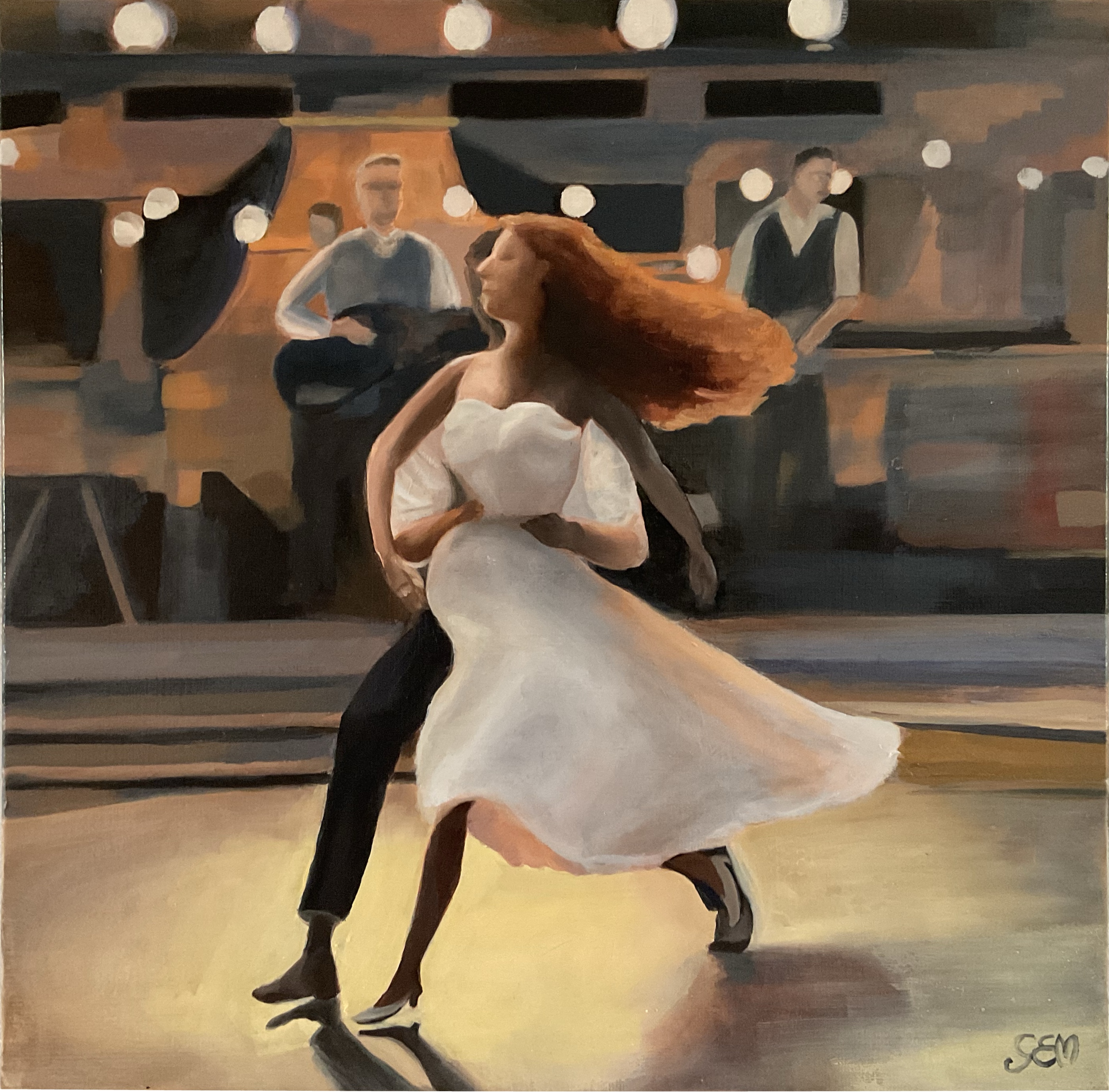 Un couple s'élance sur une piste de danse.